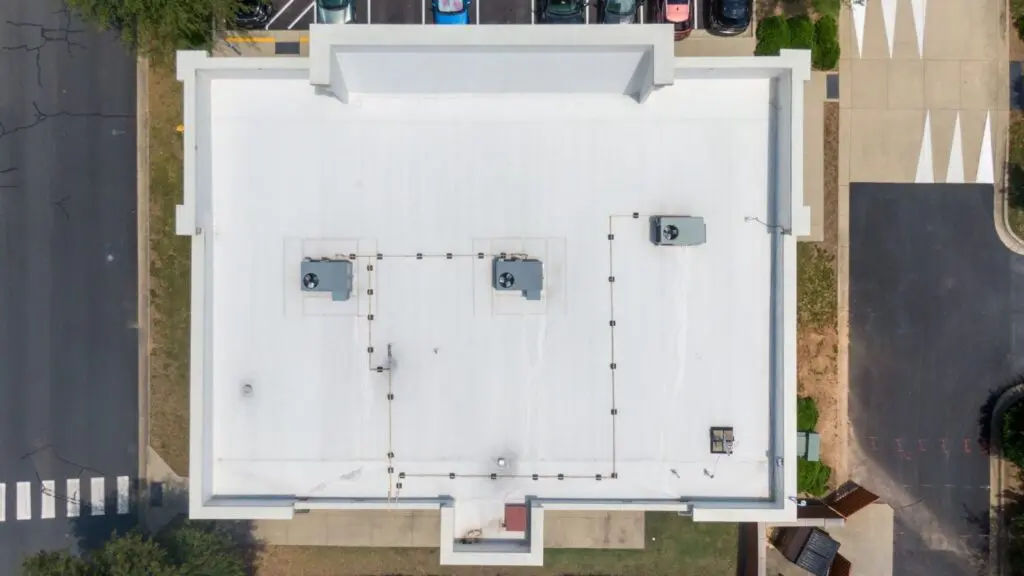 Retail business with a flat commercial roof in Colorado Springs, CO.