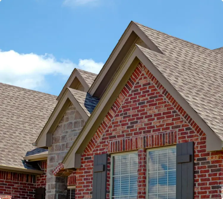 Asphalt roofing on a brick home