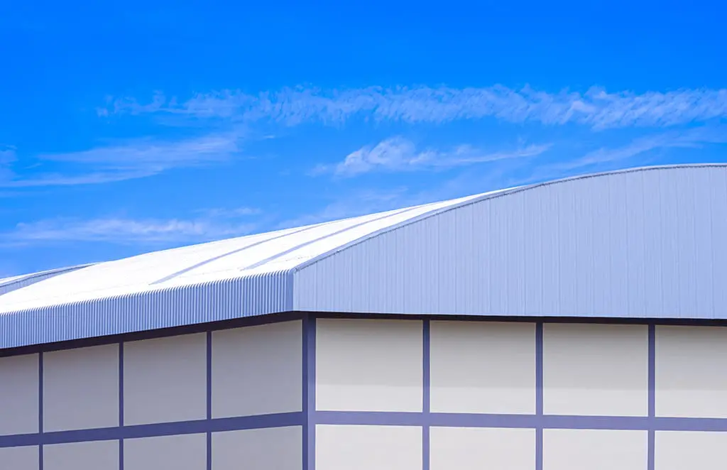 A newly installed metal roof on a commercial property