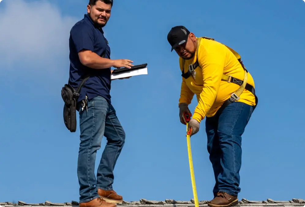 Bumble Roofing technicians performing roof replacement.